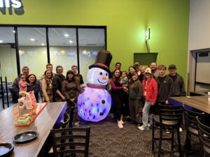 The staff of HCF and their families at the company christmas party in 2025.